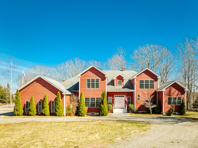 front facade featuring a front lawn