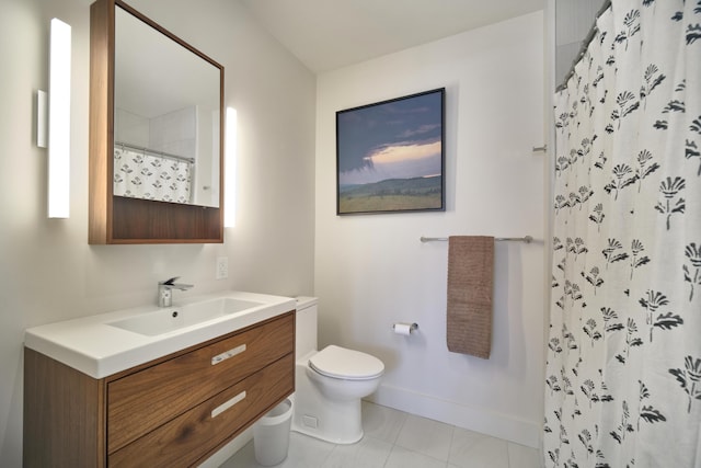 bathroom featuring toilet, vanity, tile patterned floors, and a shower with shower curtain