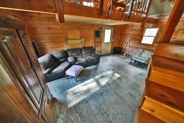 living room with wood walls