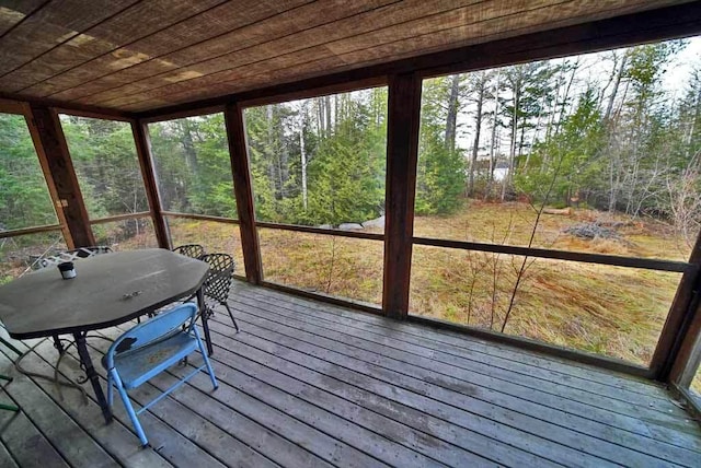 sunroom with wooden ceiling