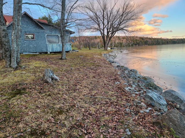 view of yard with a water view