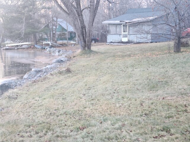 view of yard with a water view