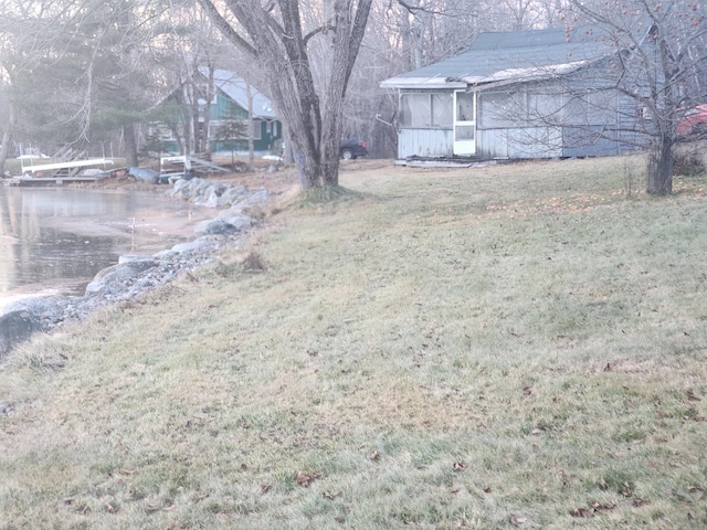 view of yard featuring a sunroom