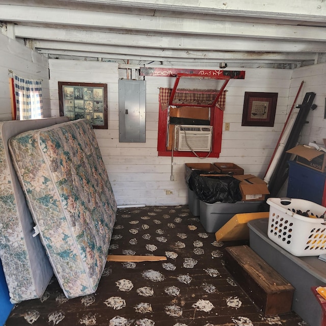 interior space featuring carpet, cooling unit, and electric panel