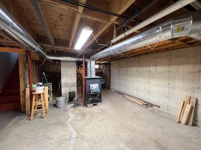 basement featuring heating unit