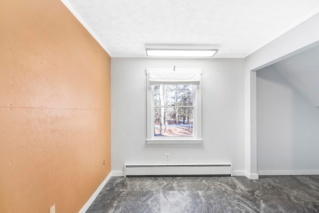 empty room with a baseboard heating unit