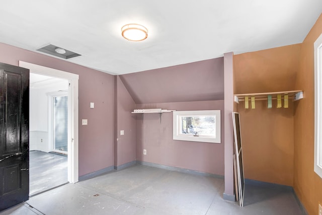 additional living space with lofted ceiling