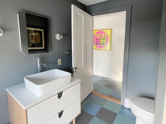 bathroom with vanity and toilet