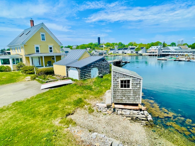 exterior space featuring a water view