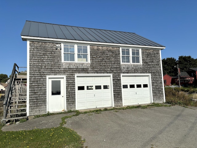 garage featuring driveway