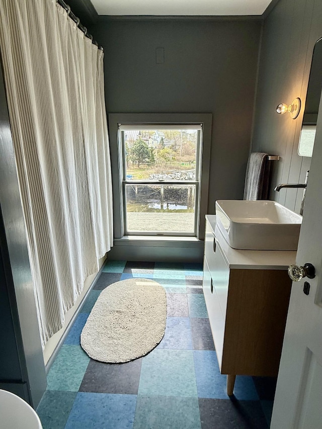 bathroom with vanity and tile patterned floors