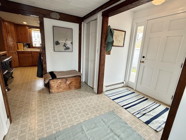 27 Clamshell Aly, Vinalhaven, ME 04863 - entrance foyer featuring a baseboard heating unit