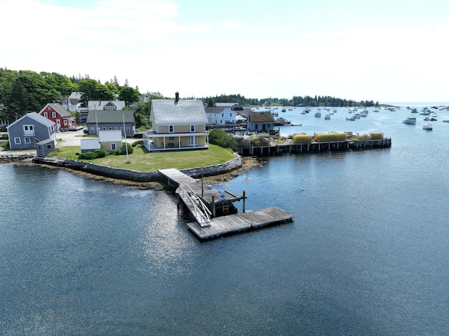 27 Clamshell Aly, Vinalhaven, ME 04863 - water view featuring a floating dock and nearby suburban area