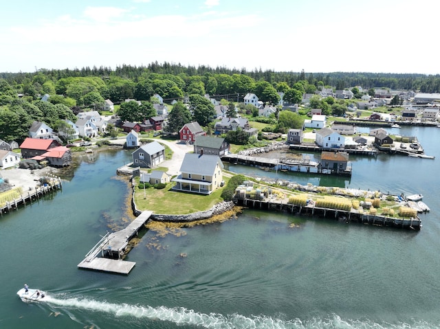 27 Clamshell Aly, Vinalhaven, ME 04863 - aerial perspective of suburban area featuring a large body of water