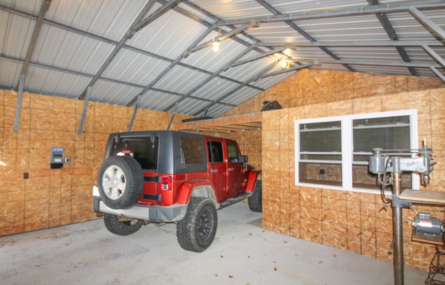 garage featuring a carport