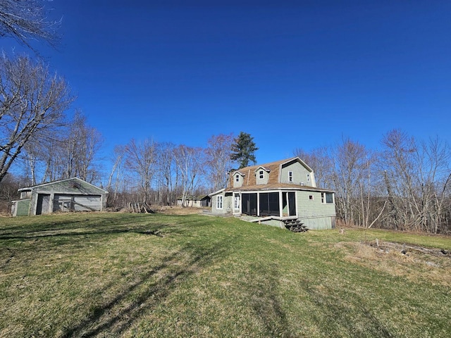 view of yard with a sunroom