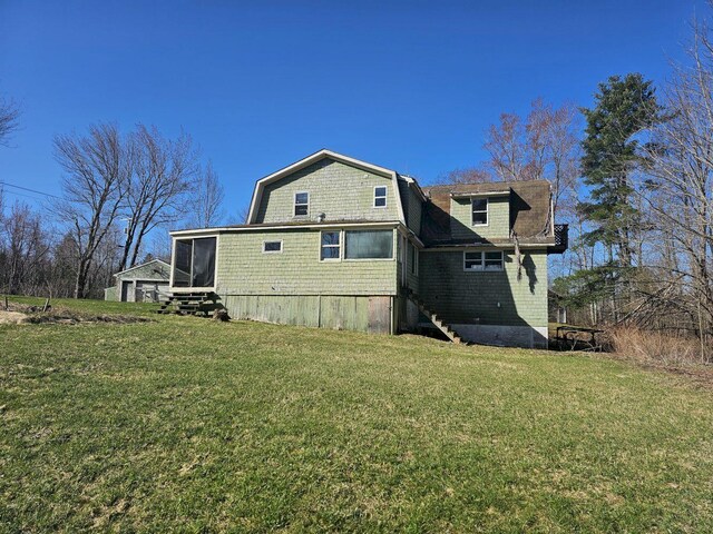 view of home's exterior featuring a yard