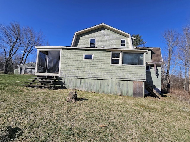 view of home's exterior with a lawn and a sunroom