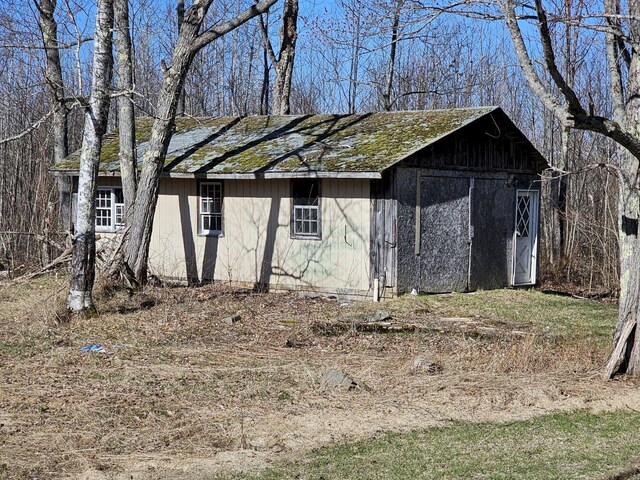 view of outbuilding featuring cooling unit