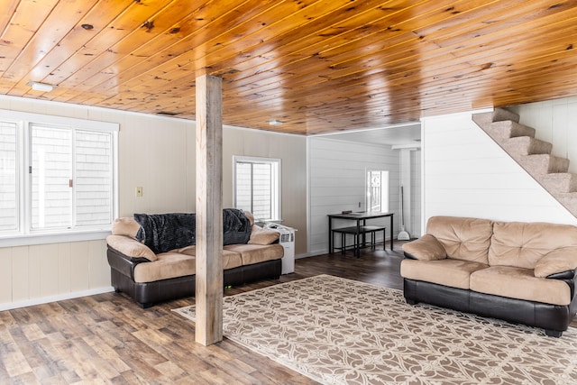 living room with wood walls, wooden ceiling, and hardwood / wood-style floors