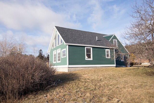 exterior space featuring a lawn