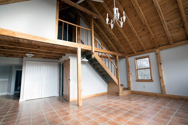 interior space featuring tile flooring and a chandelier