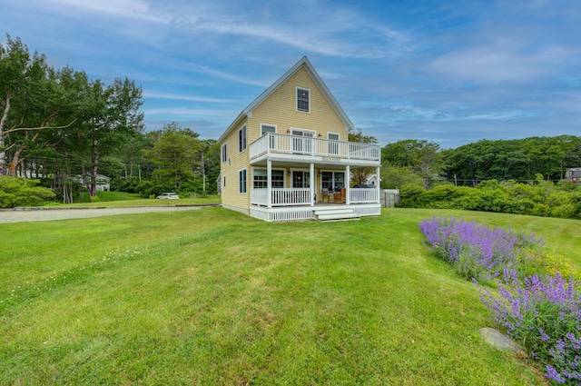 2 Maddox Pond Rd, Biddeford, ME 04005 - rear view of property with a yard, covered porch, and a balcony