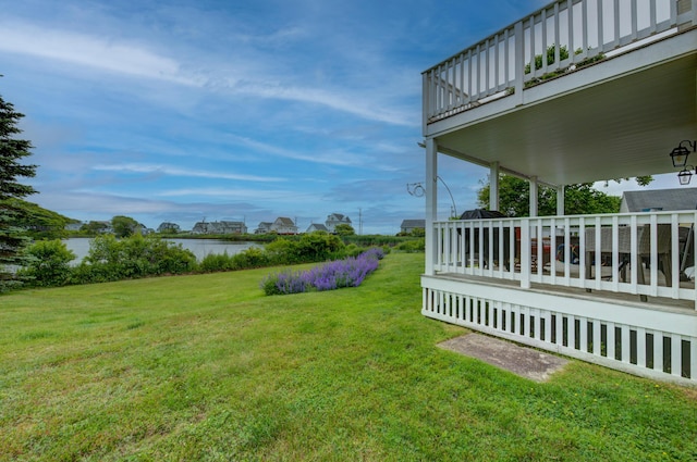 2 Maddox Pond Rd, Biddeford, ME 04005 - view of green lawn with a deck with water view