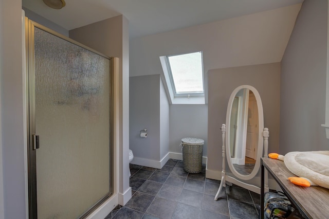 2 Maddox Pond Rd, Biddeford, ME 04005 - bathroom featuring a skylight, a stall shower, and tile patterned floors