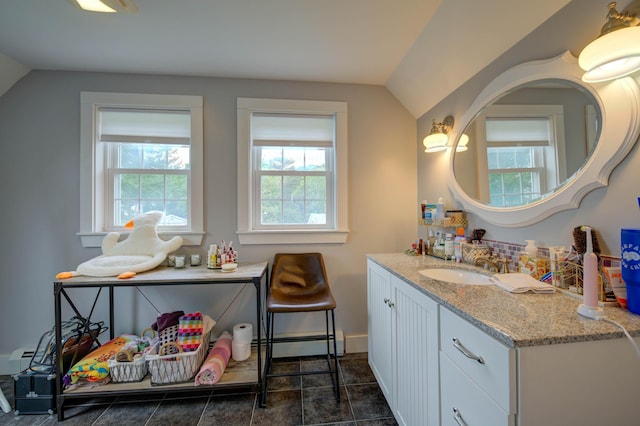 2 Maddox Pond Rd, Biddeford, ME 04005 - bathroom with vaulted ceiling, plenty of natural light, and vanity
