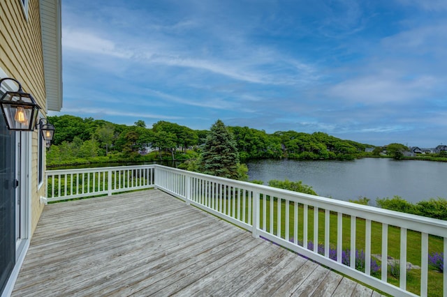 2 Maddox Pond Rd, Biddeford, ME 04005 - wooden terrace with a water view and a yard