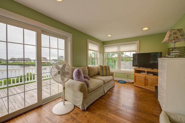 2 Maddox Pond Rd, Biddeford, ME 04005 - living room featuring hardwood / wood-style floors, a water view, and recessed lighting