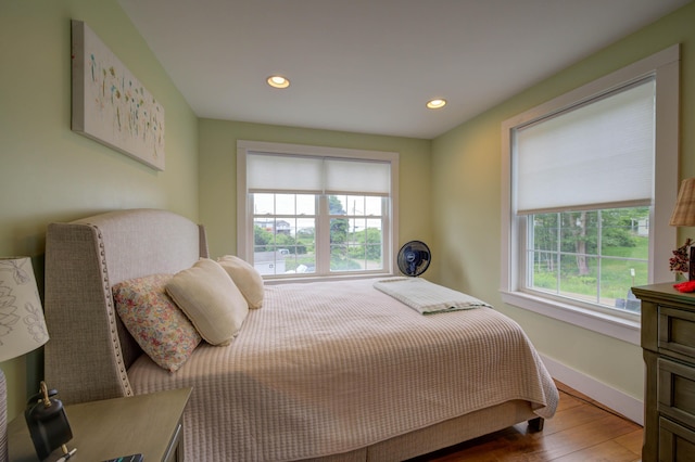 2 Maddox Pond Rd, Biddeford, ME 04005 - bedroom with multiple windows, wood finished floors, and recessed lighting