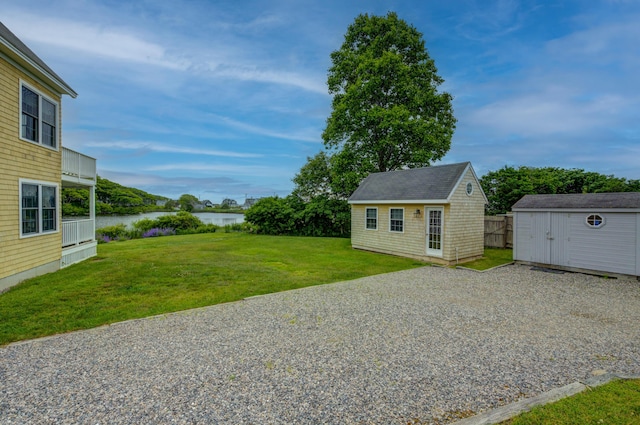 2 Maddox Pond Rd, Biddeford, ME 04005 - view of green lawn featuring a water view and an outbuilding