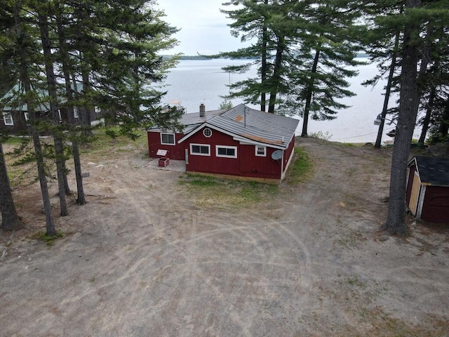 exterior space with a water view