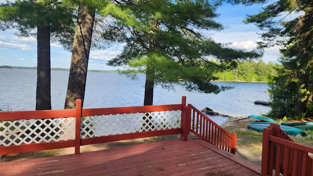 21 Greystone Ln Unit T4, Indian Purchase Twp, ME 04462 - deck featuring a water view