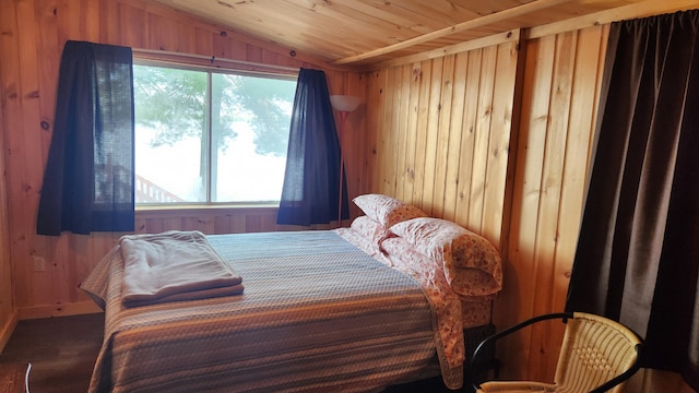 21 Greystone Ln Unit T4, Indian Purchase Twp, ME 04462 - bedroom with wooden walls and lofted ceiling