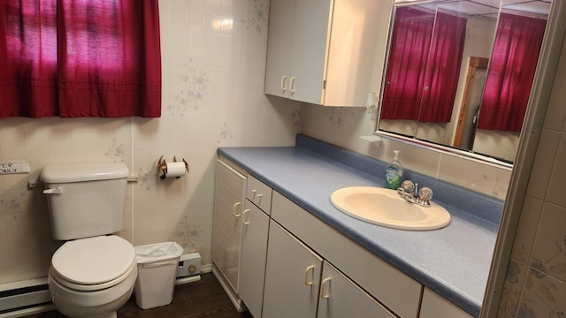 21 Greystone Ln Unit T4, Indian Purchase Twp, ME 04462 - bathroom with a baseboard heating unit, vanity, tile walls, and wood finished floors