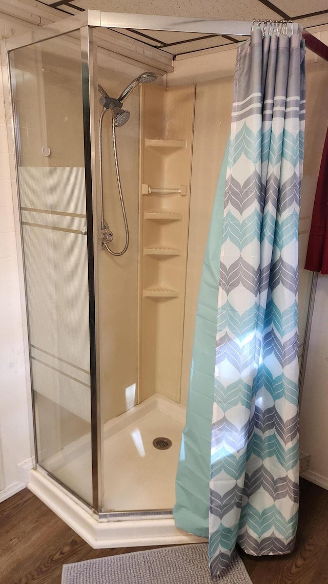 21 Greystone Ln Unit T4, Indian Purchase Twp, ME 04462 - bathroom with a shower stall and wood finished floors