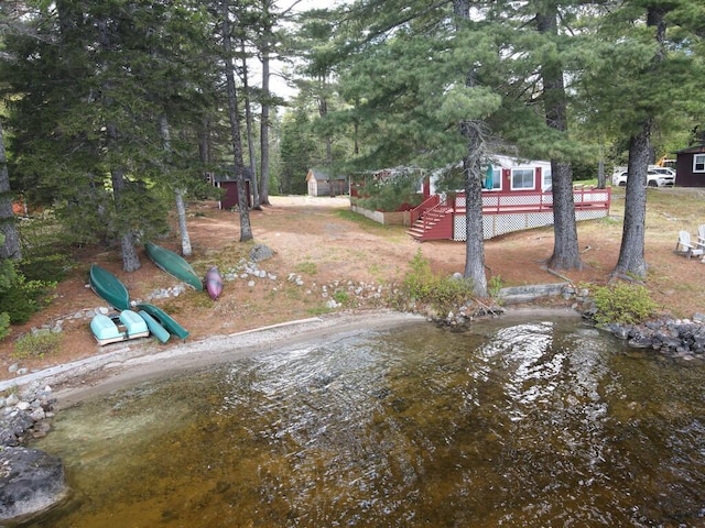 21 Greystone Ln Unit T4, Indian Purchase Twp, ME 04462 - view of yard with a wooden deck