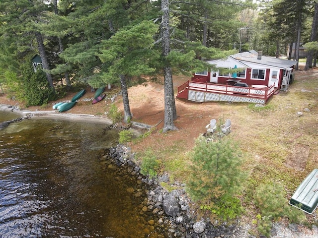 21 Greystone Ln Unit T4, Indian Purchase Twp, ME 04462 - view of yard with a deck and a wooded view