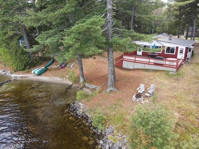 21 Greystone Ln Unit T4, Indian Purchase Twp, ME 04462 - view from above of property featuring a heavily wooded area