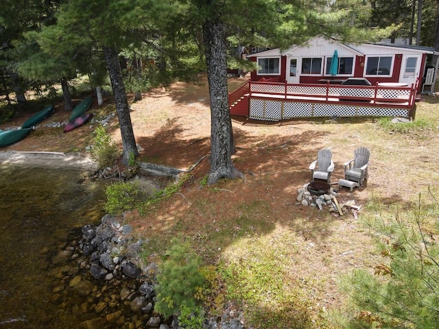 21 Greystone Ln Unit T4, Indian Purchase Twp, ME 04462 - view of yard with a deck