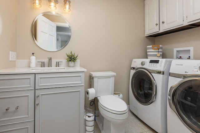 8 Hickory Ln, York, ME 03909 - laundry room with washer and clothes dryer and light tile patterned floors