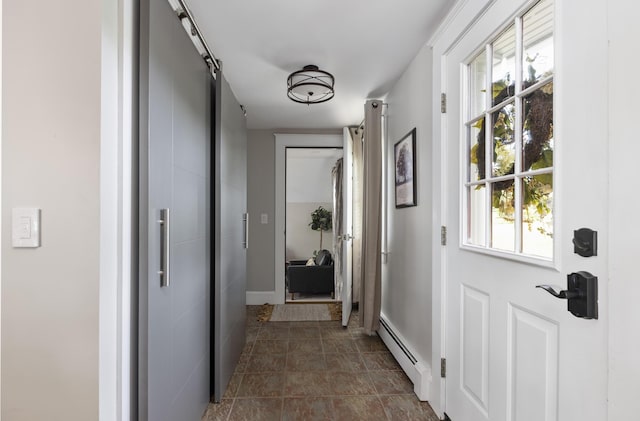 8 Hickory Ln, York, ME 03909 - hall with baseboard heating, a barn door, and baseboards