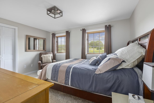 8 Hickory Ln, York, ME 03909 - carpeted bedroom with multiple windows and baseboards
