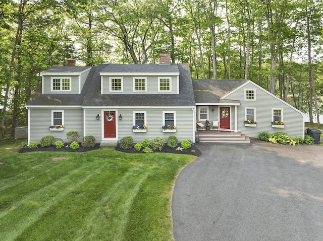 8 Hickory Ln, York, ME 03909 - dutch colonial with roof with shingles, a chimney, a front yard, and view of wooded area