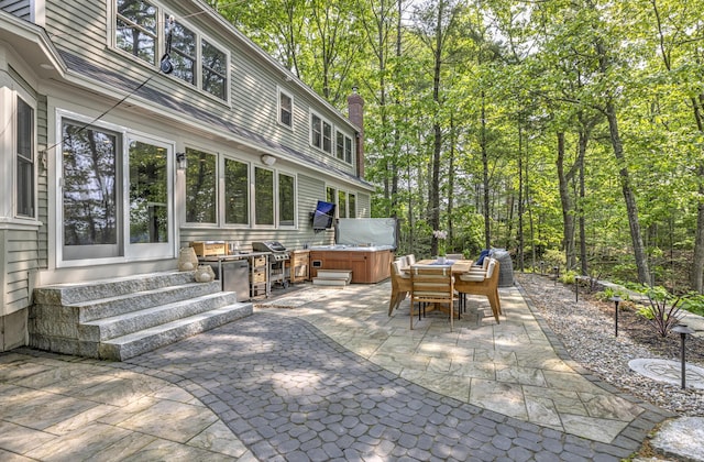 8 Hickory Ln, York, ME 03909 - view of patio featuring a hot tub, entry steps, outdoor dining area, and area for grilling