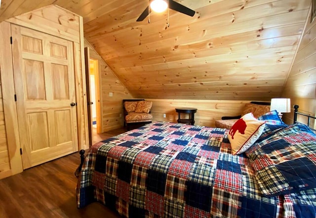 bedroom with dark hardwood / wood-style floors, ceiling fan, vaulted ceiling, wooden walls, and wood ceiling