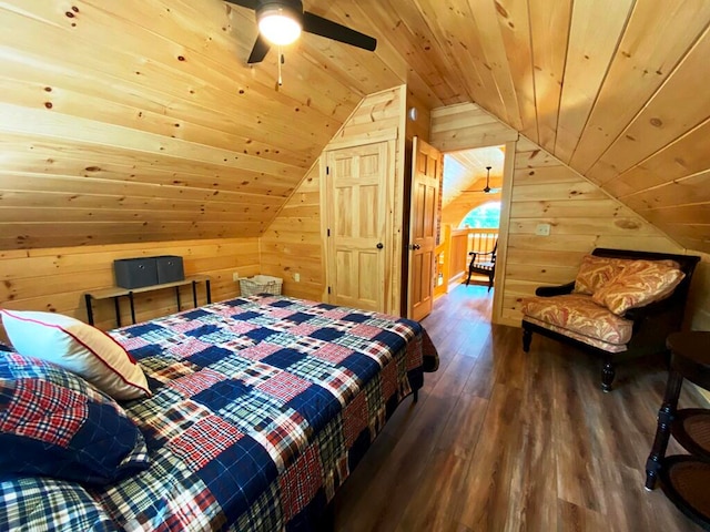 bedroom featuring wooden walls, wooden ceiling, dark wood-type flooring, and lofted ceiling